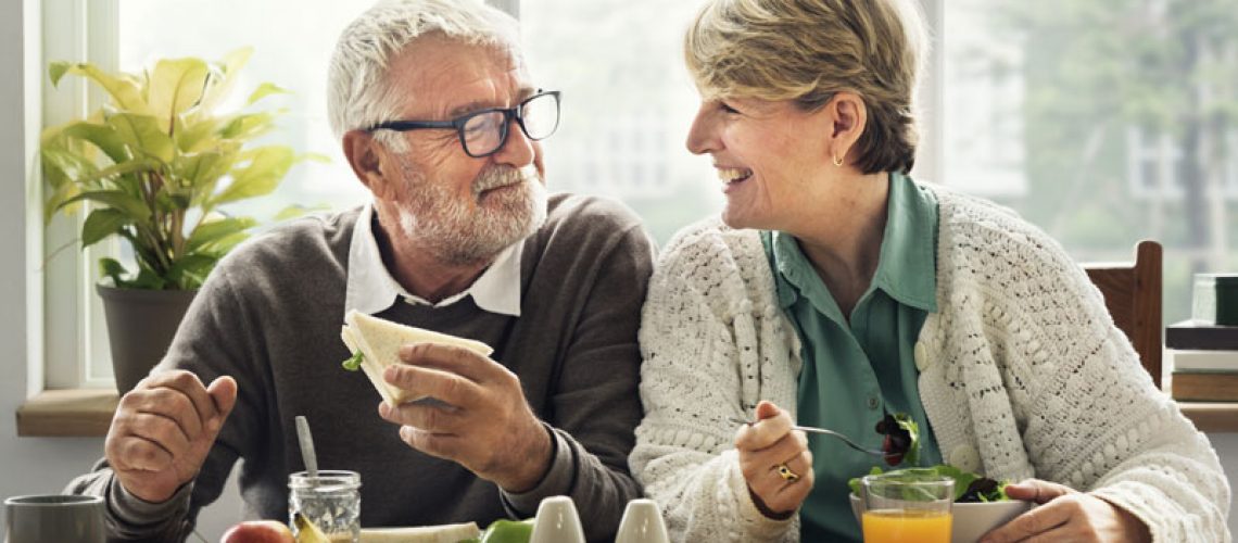 Dental Implant Patients Eating Together In St. Charles, IL